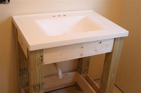 (we found a vintage sink for just $50.) the caulk will seal against leaks and keep sink in place. Ana White | Farmhouse Style Vanity Base with Slatted Shelf - DIY Projects