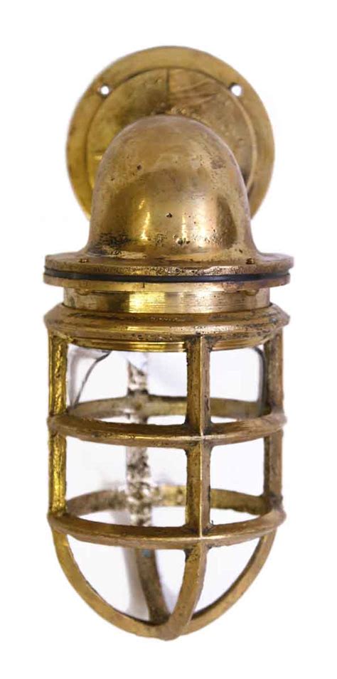 Nautical Brass Sconce | Olde Good Things 3 lights chandelier nautical cylinder clear glass hanging light with wood plank deco in brown.