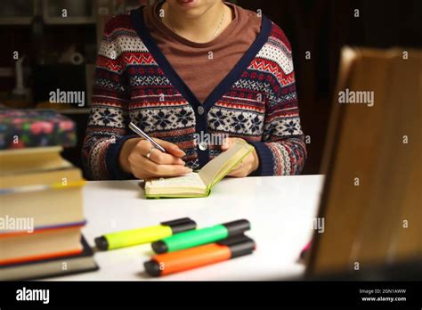 Young Woman Study At Night Millennial Student Writing In Notebook