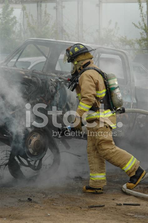 Firefighter At Truck Fire Stock Photo Royalty Free Freeimages