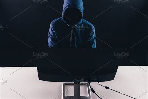 Anonymous And Faceless Hacker Under Stock Photo Containing Illegal And