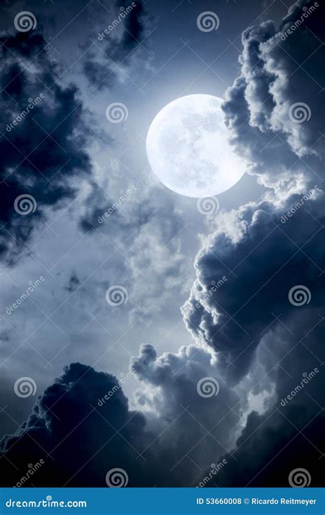 Dramatic Nighttime Clouds And Sky With Beautiful Full Blue Moon Stock