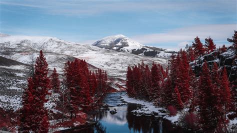 Snow Covered Mountains Rocks Red Leafed Trees Frozen River Scenery 4k