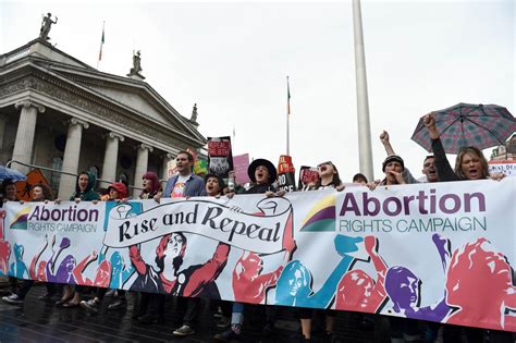 Demonstrators Take Part In A Protest To Urge The Irish Government To Repeal The 8th Amendment To