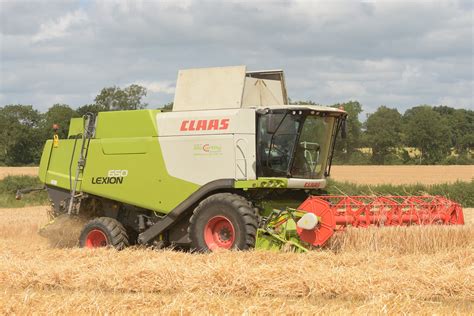 Claas Lexion 650 Combine Harvester Cutting Winter Barley A Photo On
