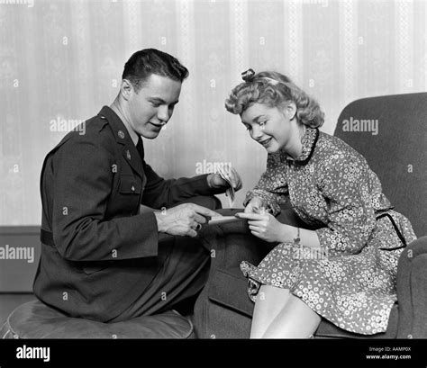 1940s A Wartime Romance Couple Man In Military Uniform Woman In Print