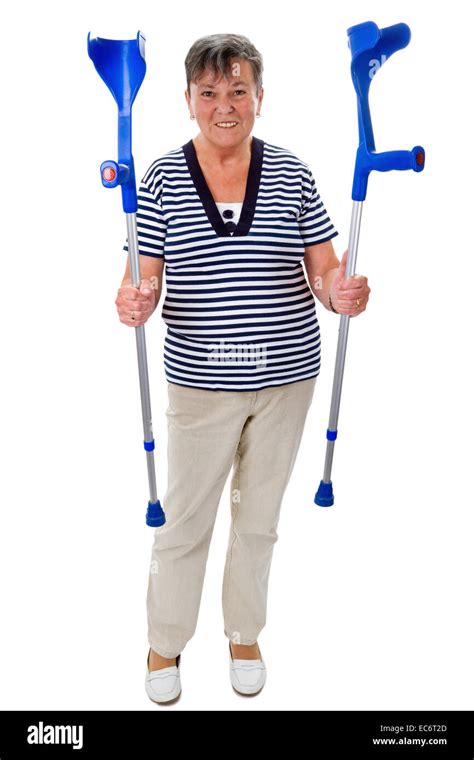 Seniorin With Crutches Stock Photo Alamy