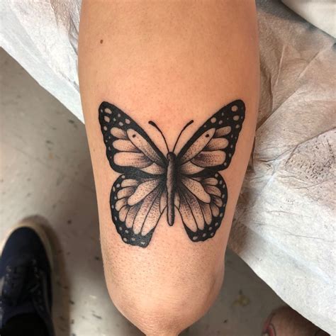 Butterfly Tattoo Above The Knee