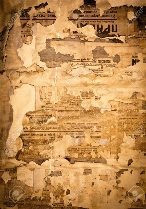 Grungy Background With Old Yellowed Soviet Newspaper Fragments