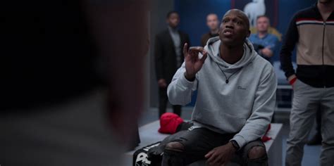 American football coach ted lasso who heads to the u.k. Drôle De Monsieur Men's Grey Hoodie In Ted Lasso S01E07 ...