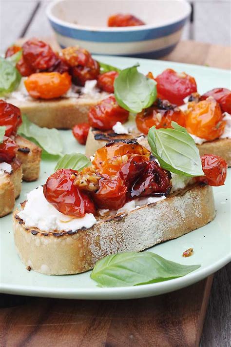 Their bruschetta has fresh goat cheese in it and since i love goat cheese anything it's no surprise i am in love with their bruschetta as well. slow-roasted tomato & ricotta bruschetta - Scrummy Lane