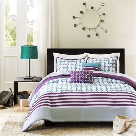 Tones of indigo and chambray blues with neutral khaki on a warm white ground create a pleasing palette that is easy to coordinate. Category: Purple White Bedding - Purple Bedroom Ideas