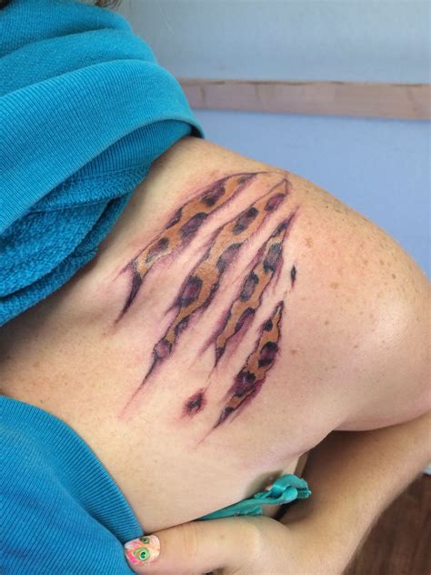 Leopard Print Tear Tattoo Done By Doug Westcott The Misfit Artist At
