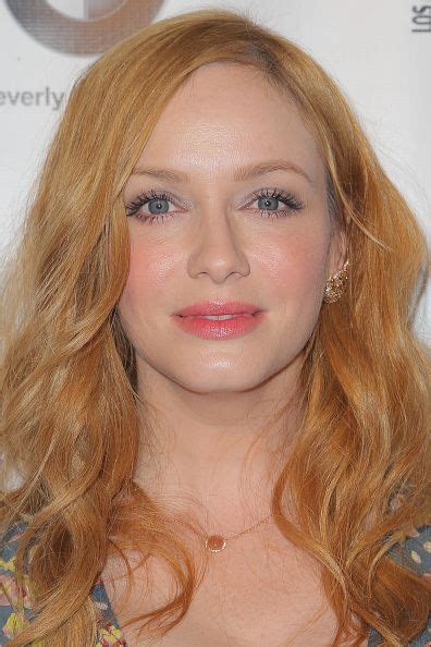 Christina Hendricks With Bouncy Waves Radiant Skin And Bright Pink