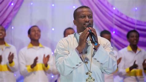 Ethiopian Orthodox Mezmur ቀሲስ ዘማሪ አሸናፊ ገማርያም ዘምር ዘምር ኣለኝ ግሩም ዝማሬ Youtube