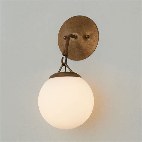 Its Simply Too Hard Not To Notice Our Striking Hooked Globe Sconce