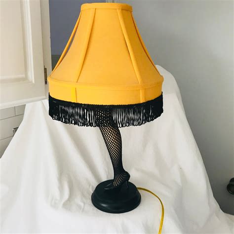 .in the wholesale gift and home decor industry. Vintage A Christmas Story Leg lamp high heel with fishnets ...