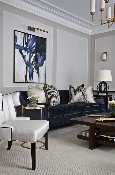 The bold patterns avoid looking too this whimsical living room is sure to delight the creative soul. navy sofa decorating with gray walls living room contemporary and brass ch andeliers | Grey ...