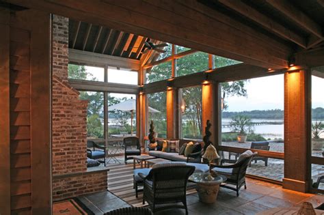Glass Uppers Protect Outdoor Fireplace On Screened Porch