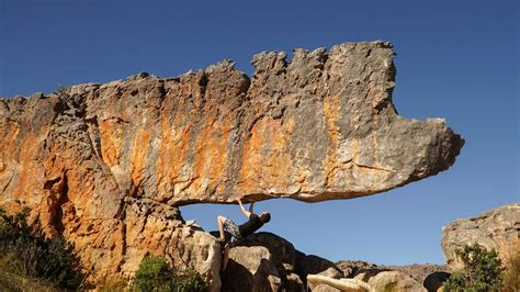 Climbing At The Rhino Boulder Rock Formation In Rocklands South