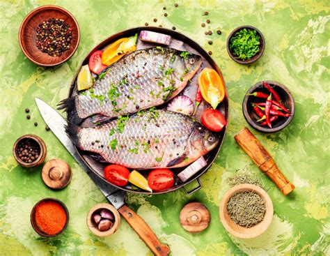 Fresh Raw Fish And Food Ingredients Stock Photo By Nikolaydonetsk