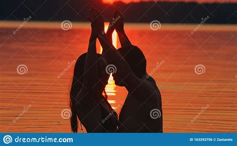 Couple In The Water At The Beach Kissing Stock Photo Image Of Couple