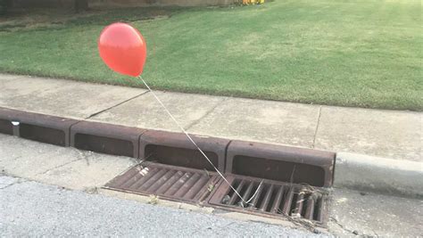 Red ‘it Balloon Spotted On Storm Drain In Edmond