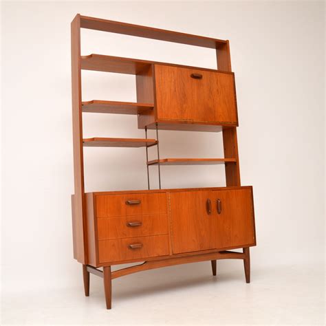Discover how a room divider can mean a single room can be dedicated to different everyday needs, and help you make your home better arranged and more functional in a flash. 1960's Vintage Teak Room Divider / Bookcase by G- plan ...