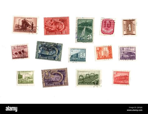 A Selection Of Old Postage Stamps From Hungary On A White Background