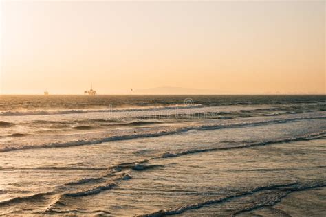 Waves In The Paciifc Ocean At Sunset In Huntington Beach Orange