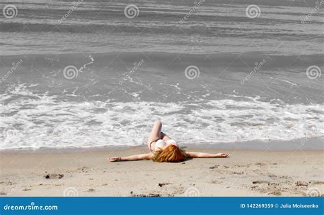 Beautiful Girl In Bikini Posing On A Deserted Beach White Sand