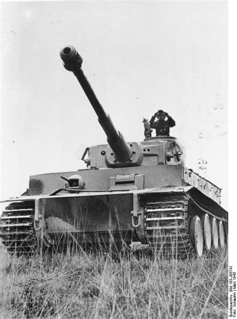 Photo A German Tank Commander Surveying The Field Atop His Tiger I