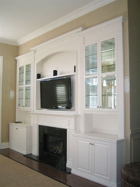 The fireplace features adjustable flame brightness, flames with or without heat, and color changing flames. White Lacquer Wall Unit with TV & Fireplace Inserts ...
