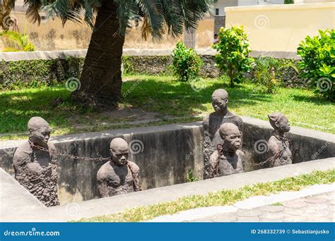 sculpture of slaves dedicated to victims of slavery in stone town of zanzibar editorial stock