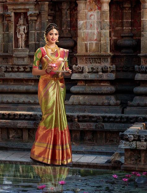 A Beautiful South Indian Bride Wearing A Kanchipuram Silk Saree And She Is Stand Bridal
