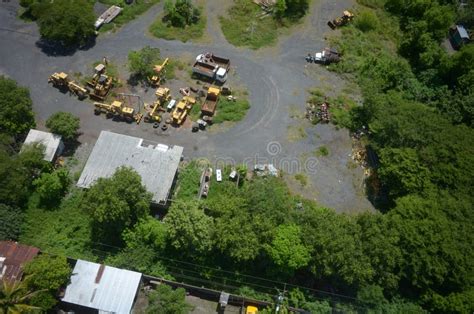 High Angle Aerial Photography Shot Of Some Trucks Working In An Area
