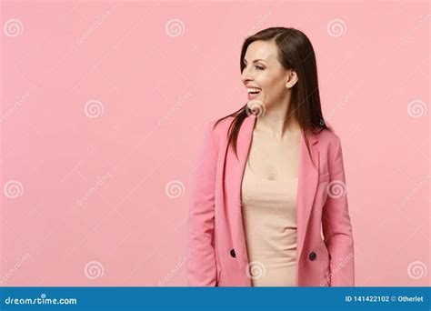 Portrait Of Stunning Laughing Young Woman Wearing Jacket Standing And Looking Aside Isolated On