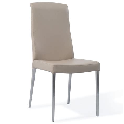 Contemporary dining chairs don't fly under the design radar. Modern Beige Leatherette Upholstered Sawyer Dining Chair ...