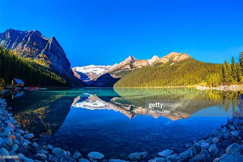 Mountain Reflection On Lake Louise At Sunrise High Res Stock Photo