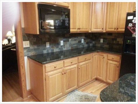 Backsplash ideas for kitchens with white cabinets. Uba Tuba Granite | Bath & Granite Denver
