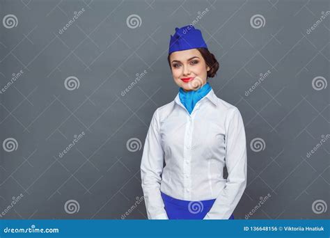 Professional Occupation Stewardess Standing Isolated On Grey Smiling