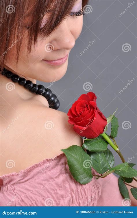 A Girl Holding A Red Rose Stock Photo Image Of Care 18046606