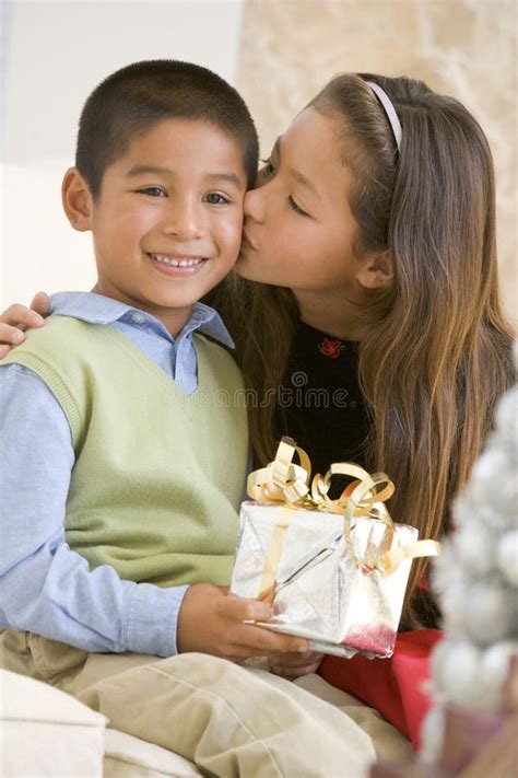 Brother Kissing His Sister On Her Cheek Stock Image Image Of Sitting Siblings 32101705