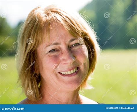 Smiling Mature Woman Outdoor Portrait Stock Photo Image Of Smiling Senior