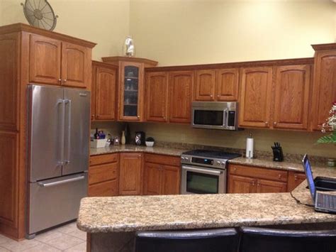 Paint or stain oak kitchen cabinets. Oak kitchen cabinets HELP what to do stain or paint?