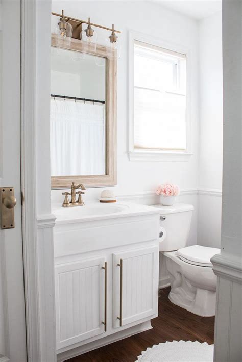 There are many bathroom vanity ideas that you can choose. White Bathroom with Brass Accents | White vanity bathroom ...