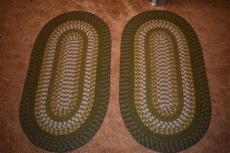 Lot Pair Of Oval Braided Rugs