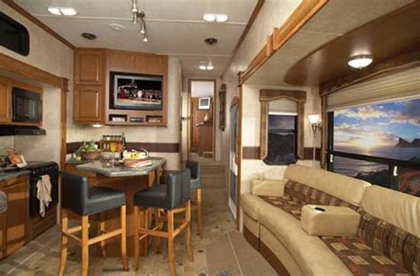 The bedroom is on the upper deck, bathroom is on mid deck, kitchen and cargo on the. 2010 Keystone Raptor Fifth Wheel Toy Hauler | Roaming Times