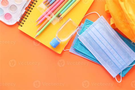 Colorful School Supplies On Orange Background 2180083 Stock Photo At