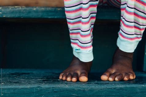 black girl s feet in pijamas by stocksy contributor gabi bucataru stocksy